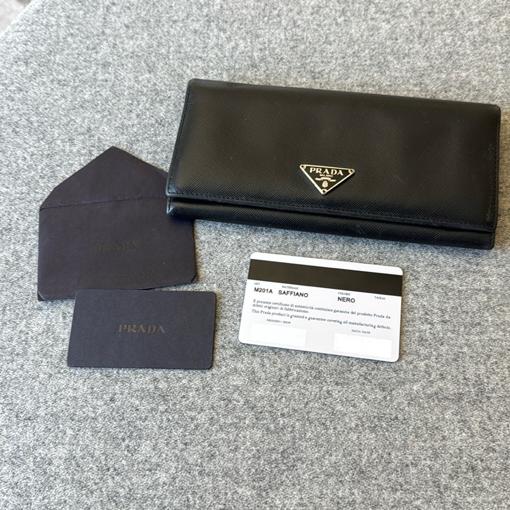 Prada leather wallet with authenticity certificate